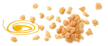 Foto af en klat honning og propolis